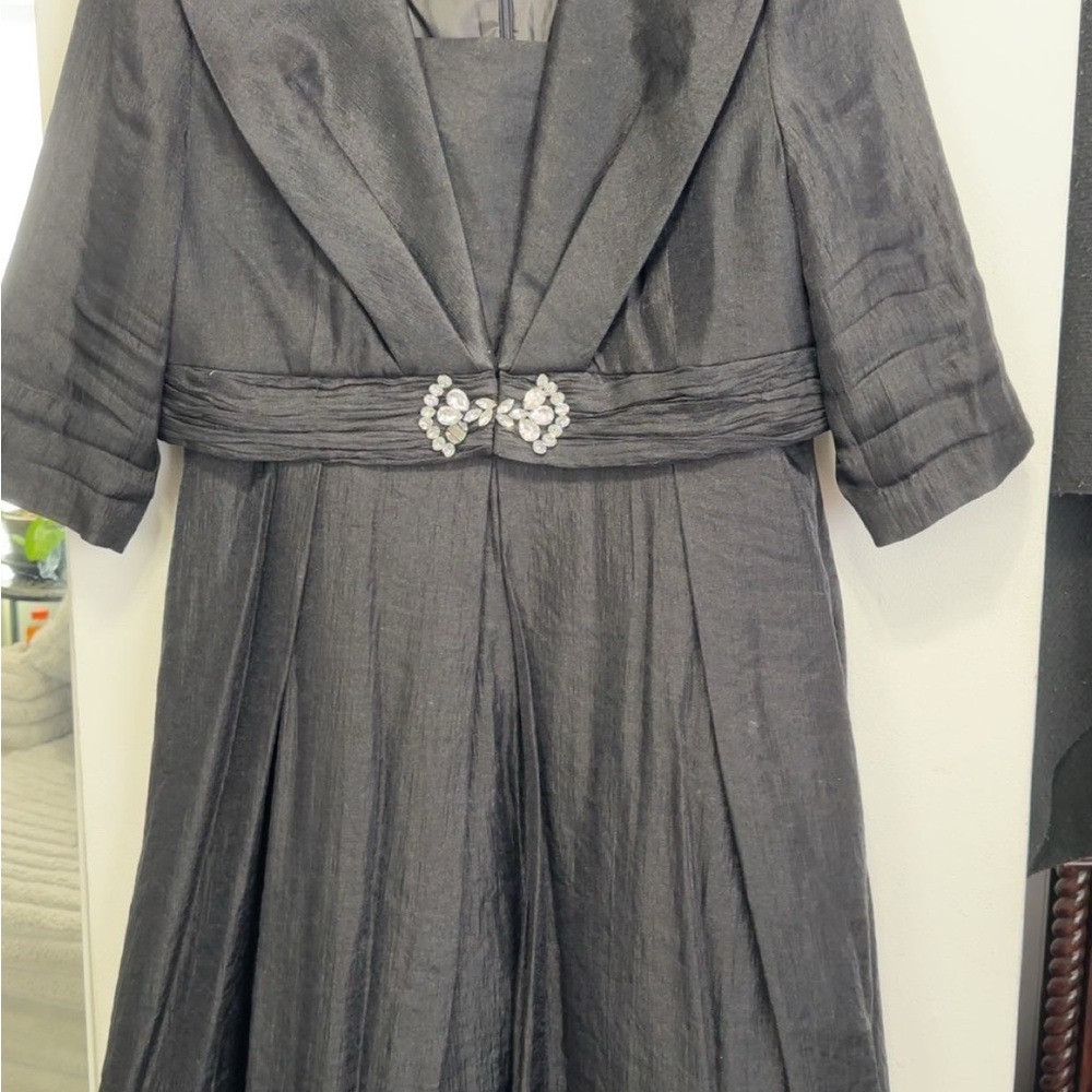 Elegant Black Dress with Embellished Waist